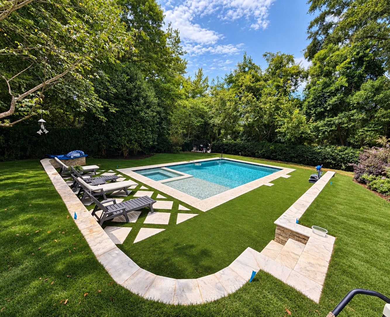 Completed backyard pool and outdoor living space